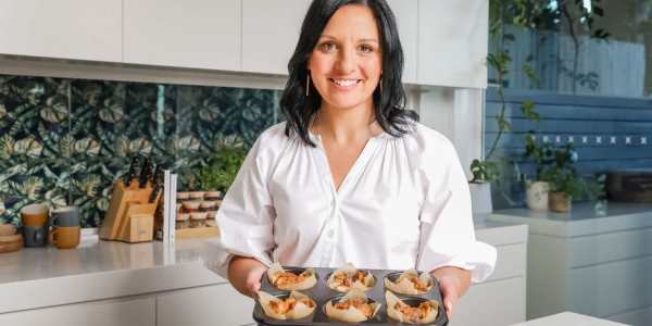 Chef showing muffins