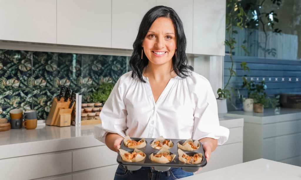 Chef showing muffins