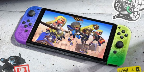 Top-down view of the Splatoon 3 Switch OLED console in handheld mode, with Splatoon 3 artwork on the screen.