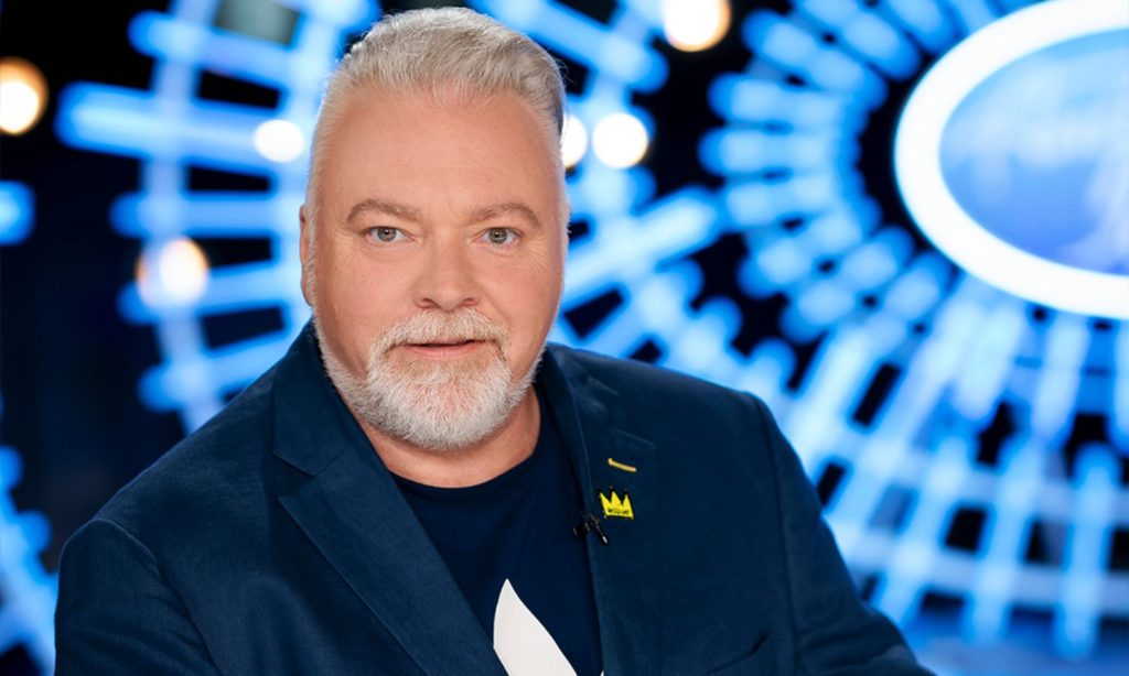 Kyle Sandilands seated at the Australian Idol Judging desk for 2023 auditions.