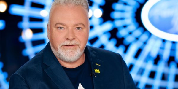 Kyle Sandilands seated at the Australian Idol Judging desk for 2023 auditions.