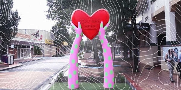 The iconic hands holding a heart statue in Lismore town centre.