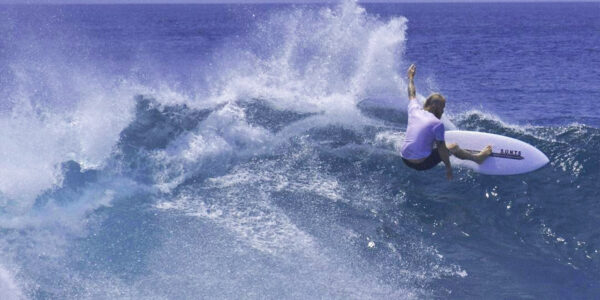 An image of Australian surfer Blakey Johnston surfing. He is currently trying to complete a 40 hour surf Cronulla.