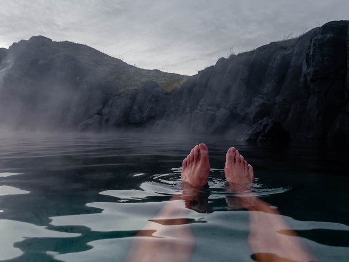 A person relaxing in a hot spring.
