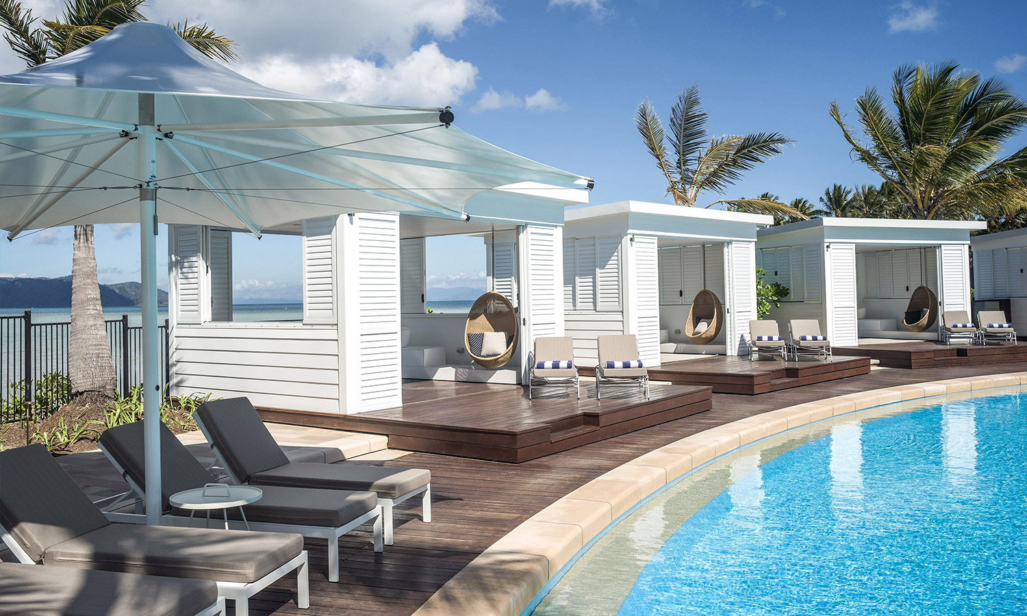 An image showing the poolside cabins at Hayman Island.