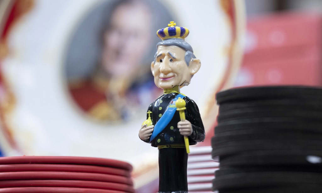 An image of a bobble-head King Charles to illustrate the preparation that London is going through for the coronation.