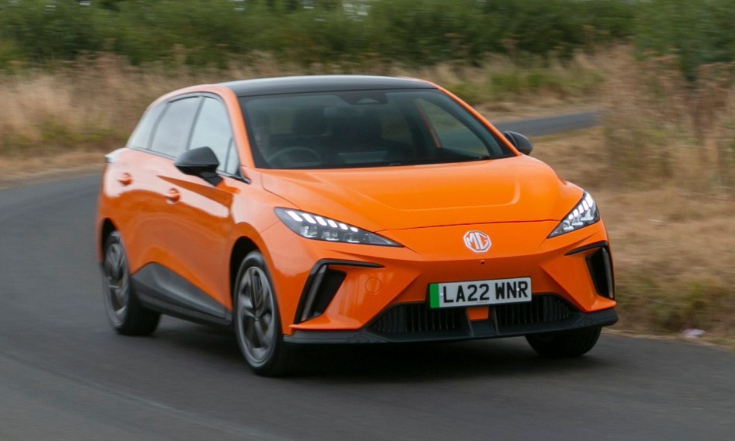 An image showing the 2023 MG 4 Excite in orange.