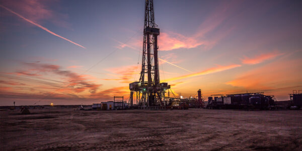 An image showing a fracking set up in a desert.