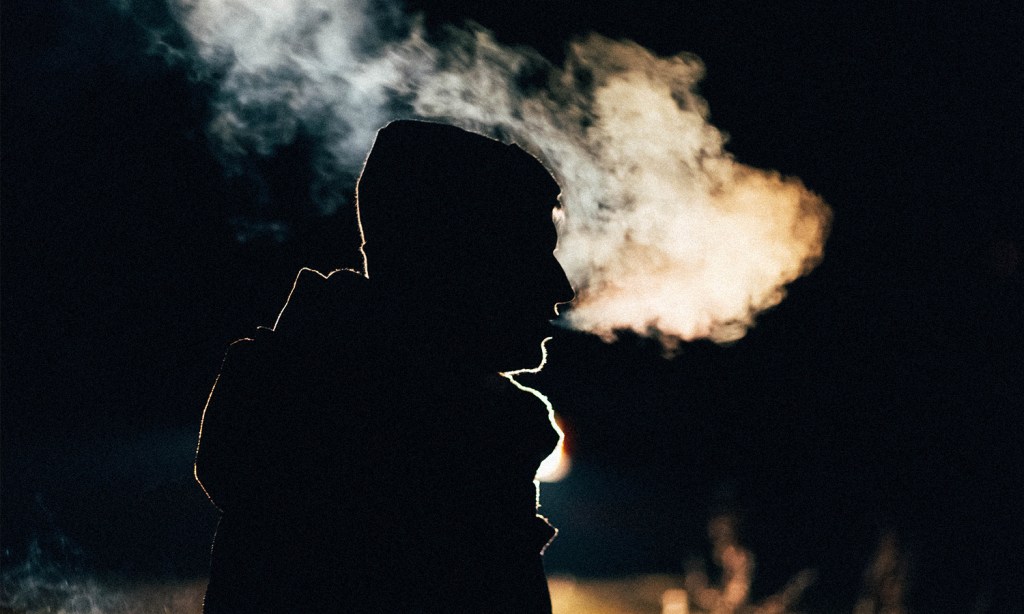 Southeast Australia has been hit by a major cold front. Image shows a man breathing steam in the cold weather.