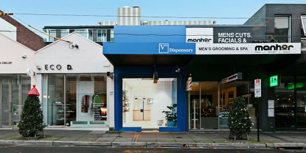 The storefront of V22 Dispensary in Melbourne offering cannabis and psychedelic therapy.