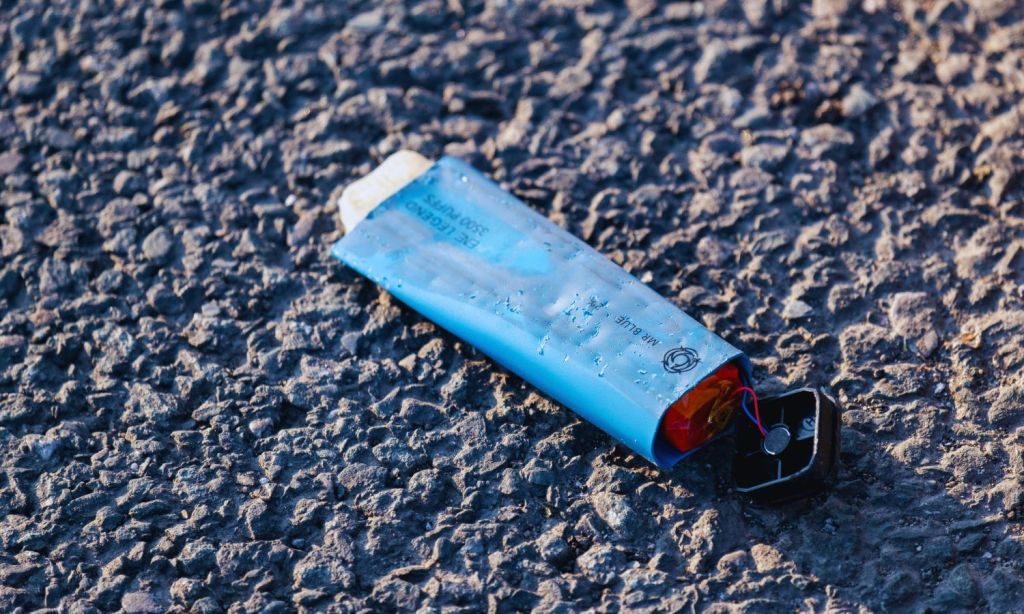 An image showing a cracked vape on the floor to illustrate the new vape crackdown in australia