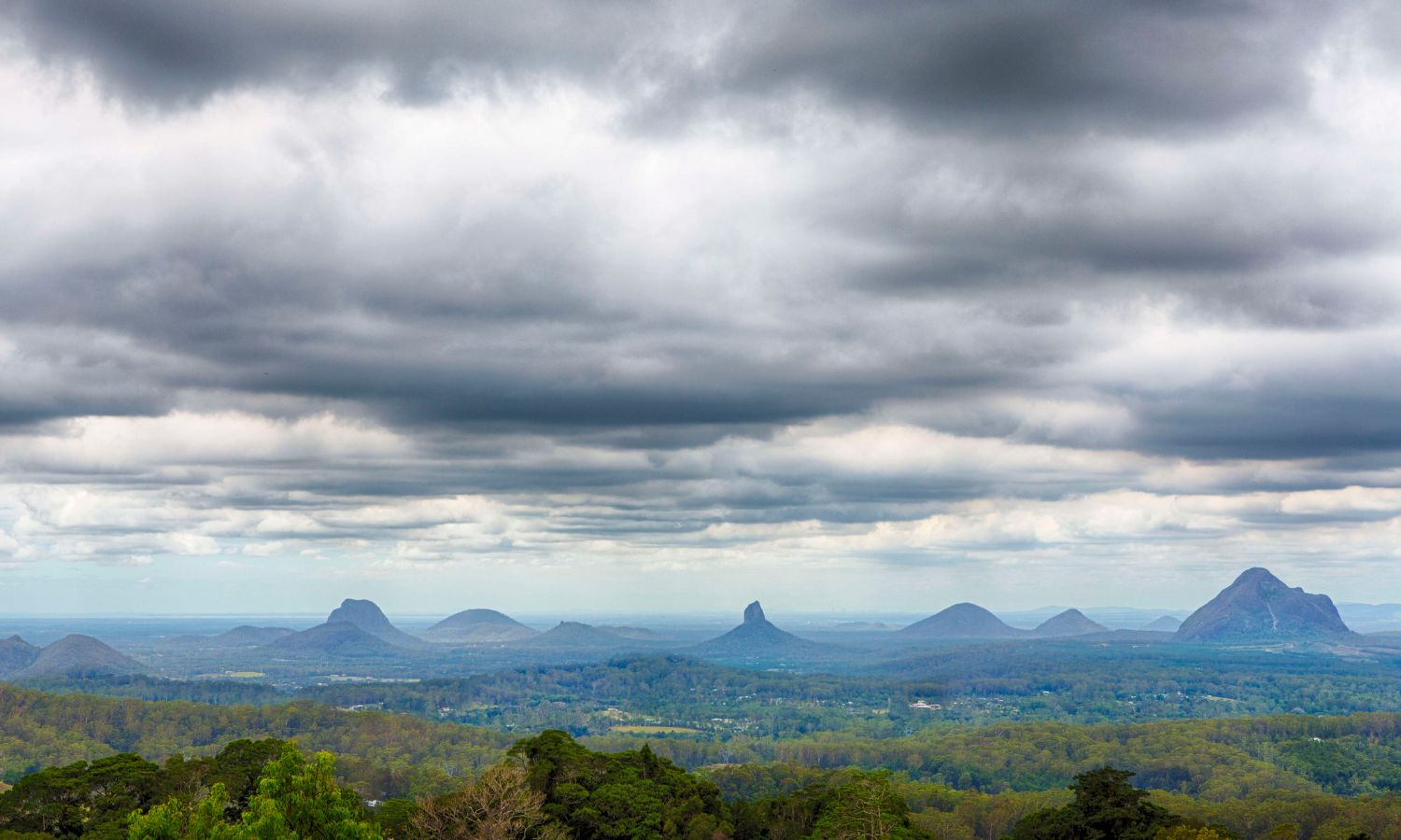 An image of the Glass House Mountains in Queensland, an area of spiritual significance to the Indigenous people that has been the subject of debate this NAIDOC Week