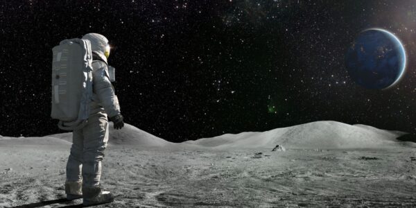 An image showing a spaceman looking out into space to illustrate a story on NASA looking for aliens and UAPs