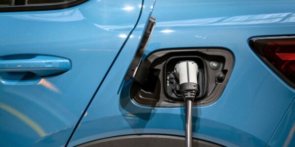 An image of an EV car charging to illustrate the fact EV charging will no longer be free on the NRMA