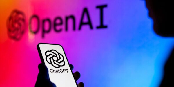 An image of the OpenAI logo and the ChatGPT logo to illustrate an article about the new voice and image search functions that the AI chatbot has