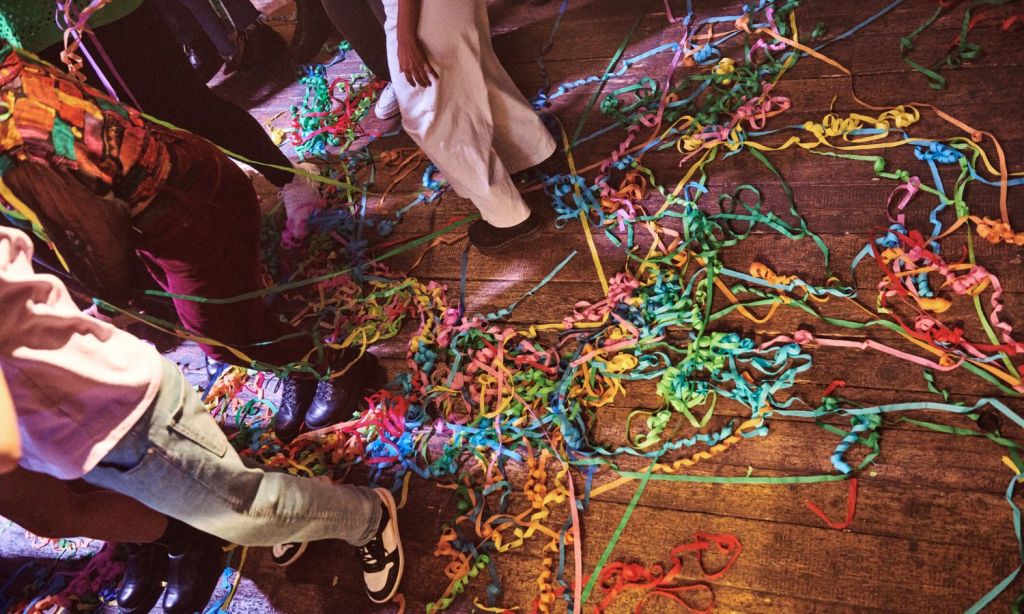 an image of a party in an airbnb which is being banned using ai