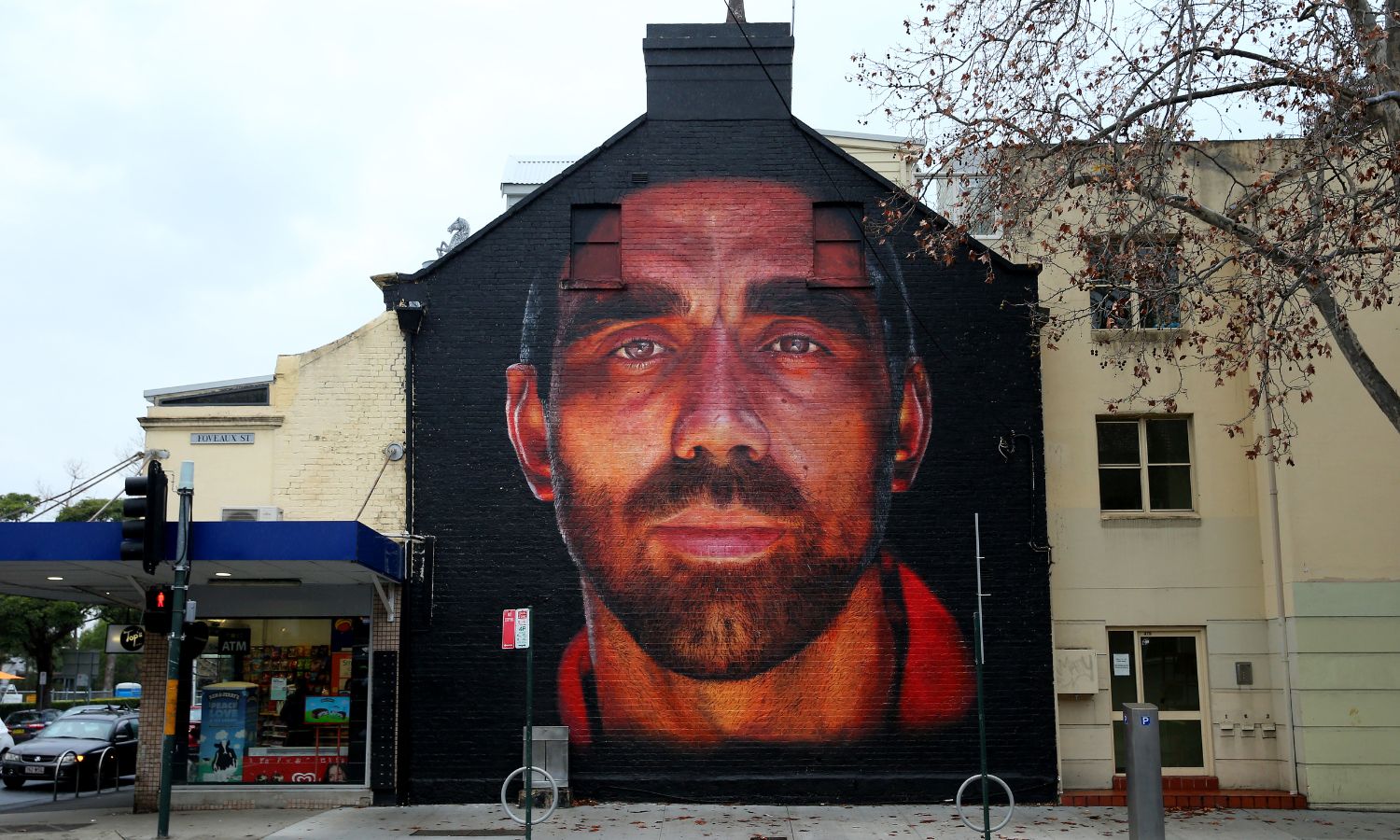 Image showing a mural of Indigenous AFL player Adam Goodes 