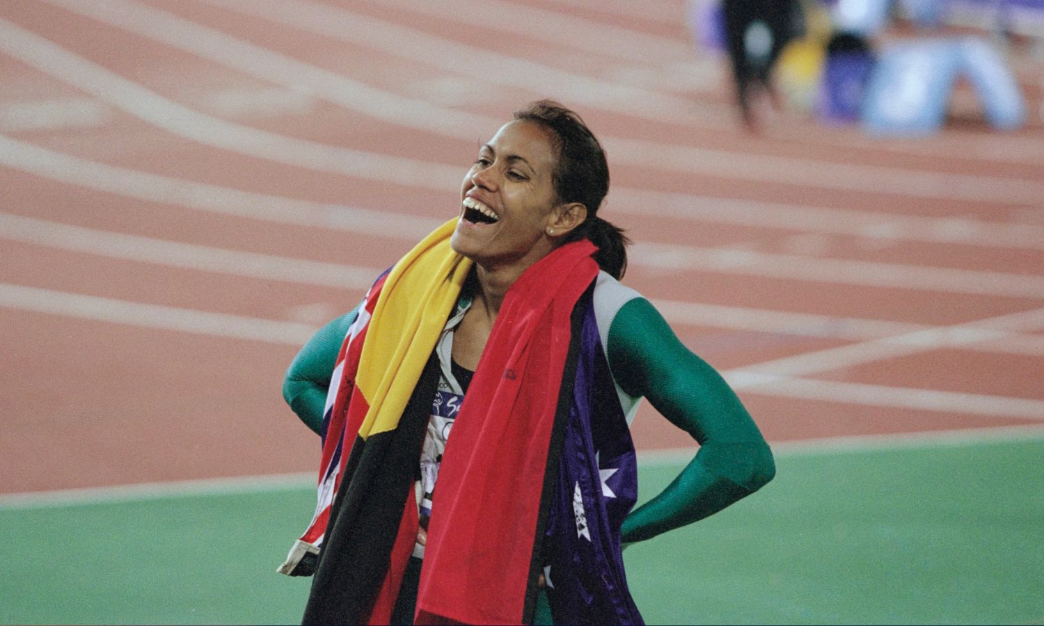 Cathy Freeman celebrating at the 2000 Olympics