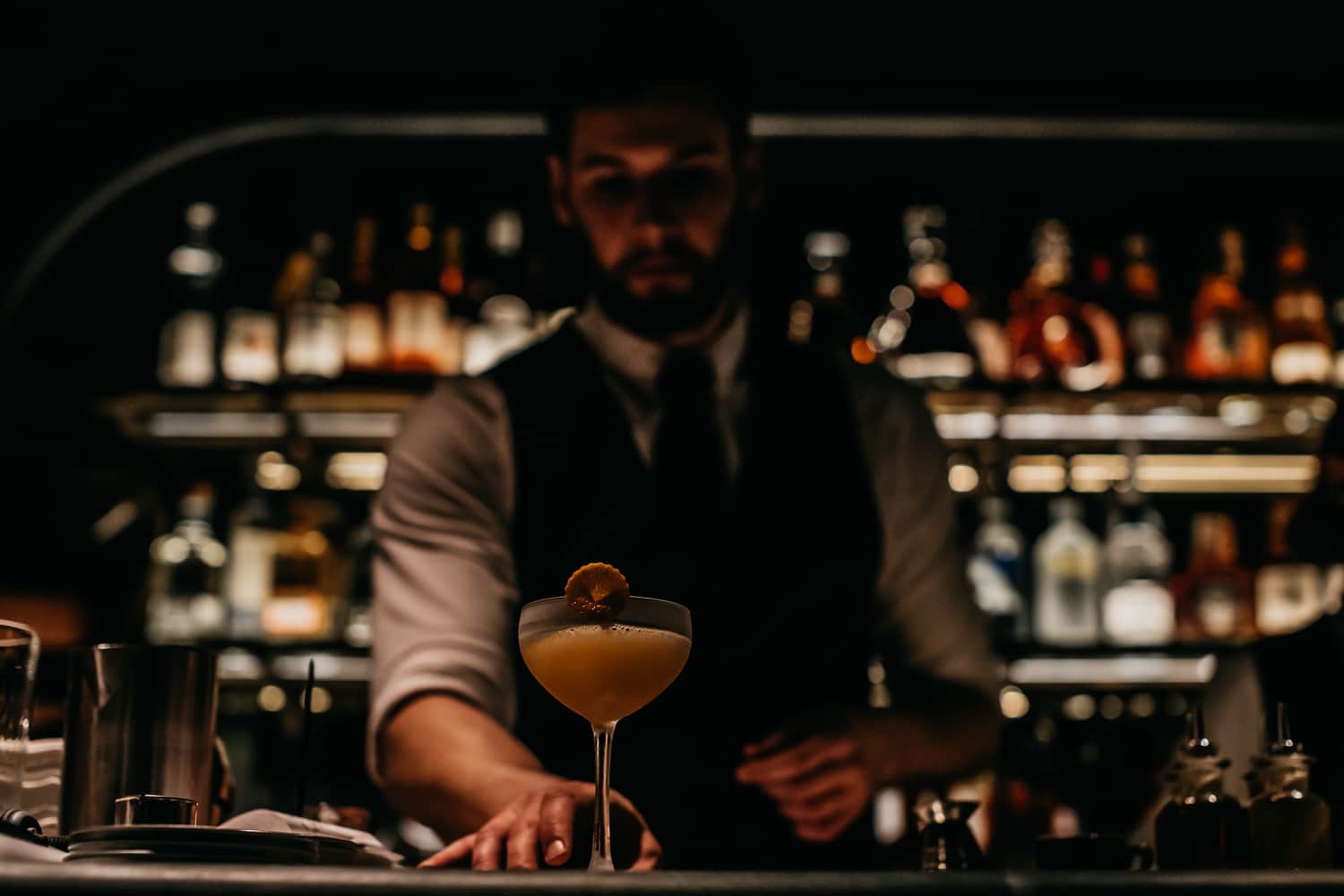 Bartender with cocktail