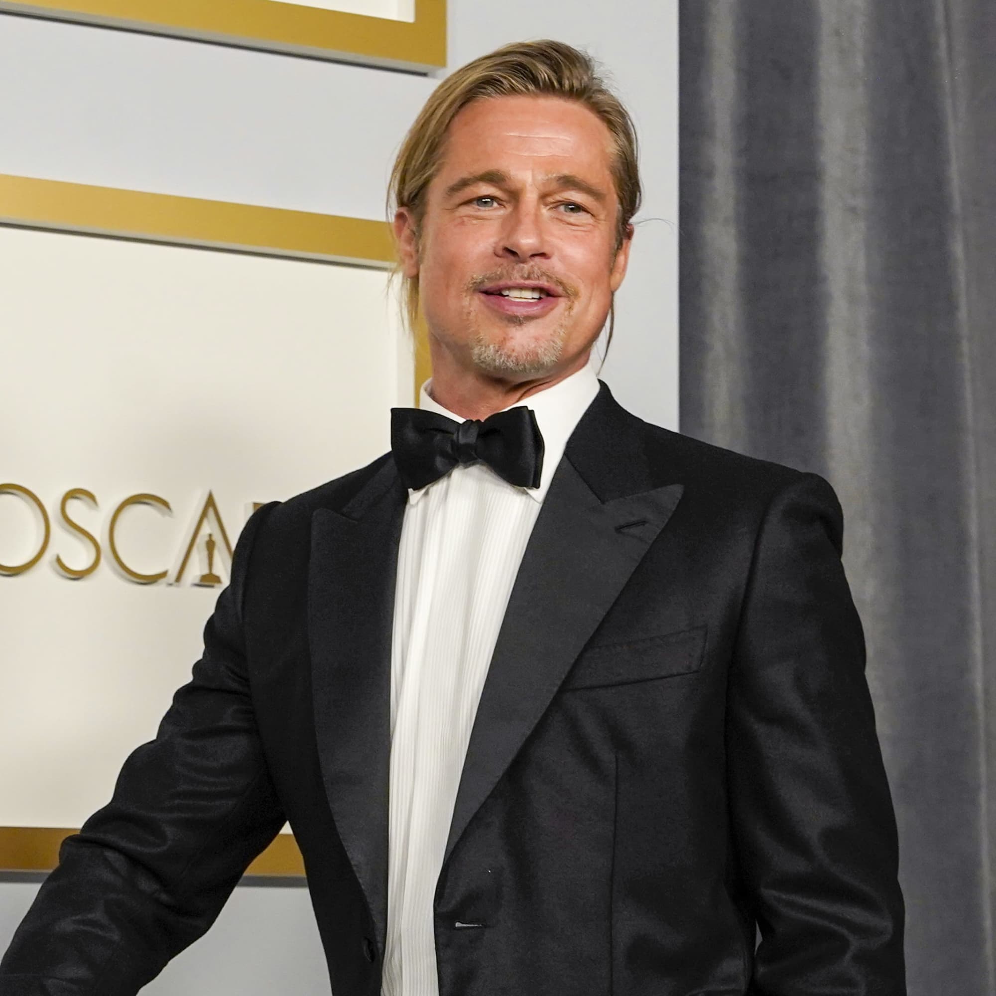 Brad Pitt Has Mastered the Art of the Low Messy Bun - POPSUGAR Australia