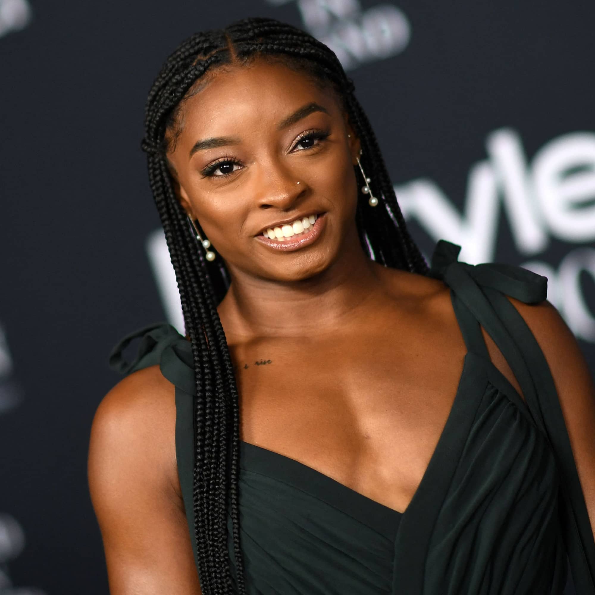 Simone Biles Celebrates Her Birthday in a Backless Halter Dress on the ...